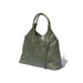 A green tote bag with a 1970's silhouette handcrafted from sustainable leather and lined with 100% Ethiopian cotton.