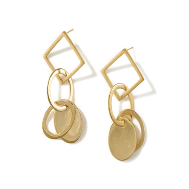 A striking pair of drop earrings handcrafted from upcycled brass and inspired by female artists Hilma af Klint and Emma Kunz.