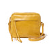 A yellow crossbody camera bag handcrafted from sustainable leather and upcycled brass hardware, featuring a hand-loomed cotton lining and an interior pocket.