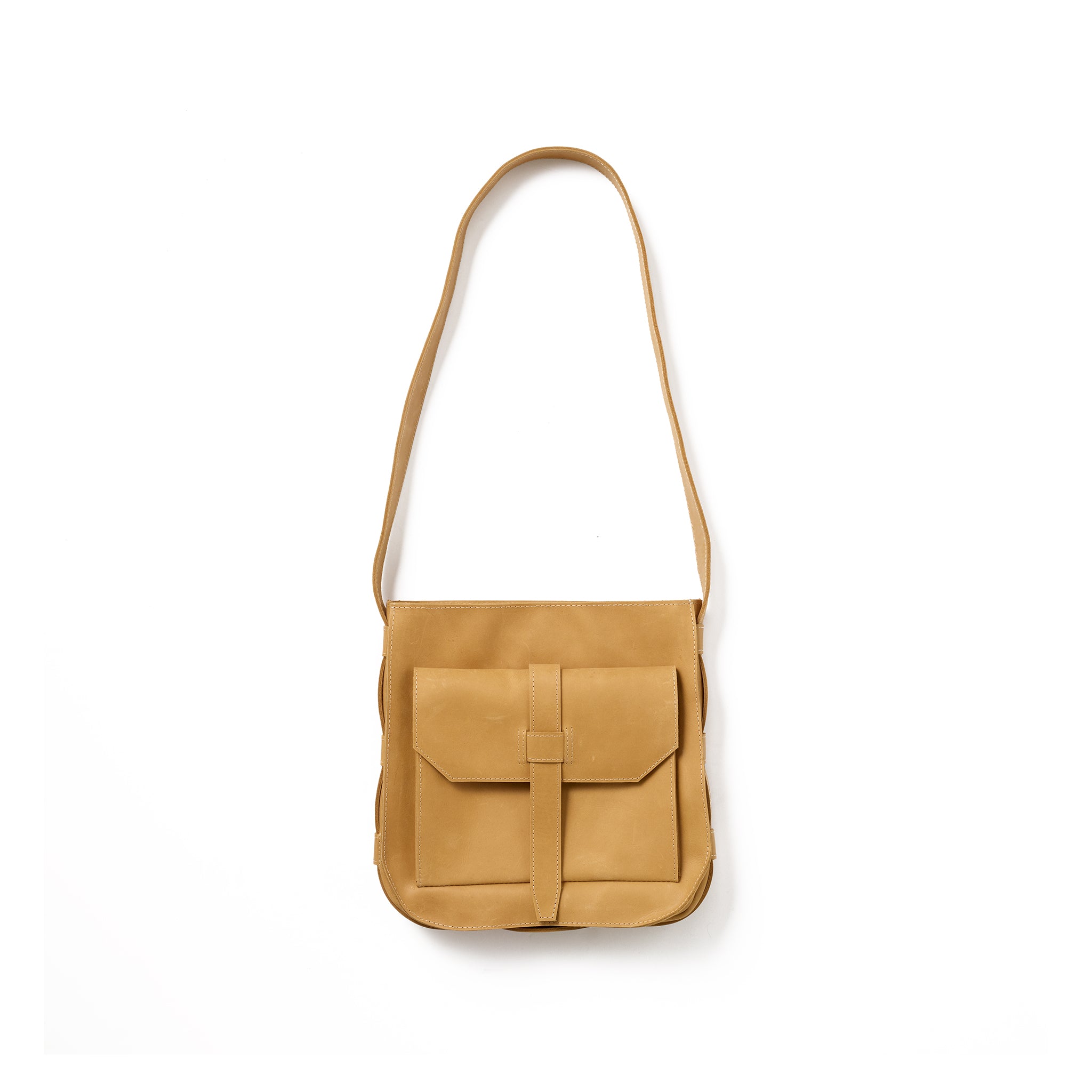 A yellow crossbody bag handcrafted from sustainable leather that makes a faithful companion for your everyday pursuits.