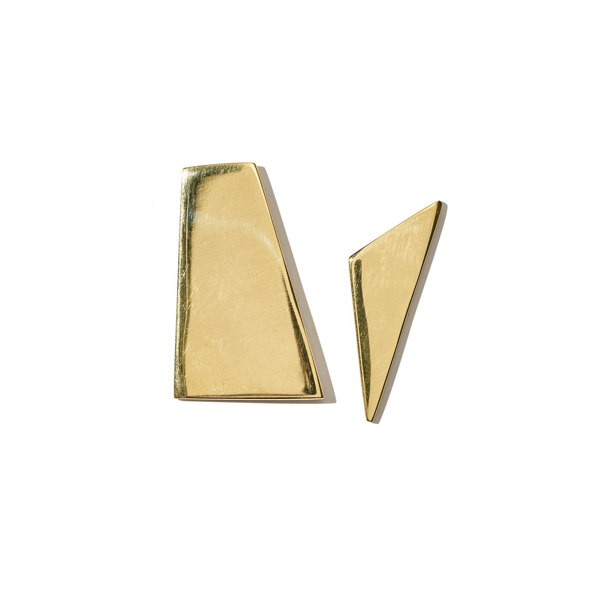 Modern and asymmetric stud earrings inspired by the work of Ellsworth Kelly and handcrafted from upcycled brass.