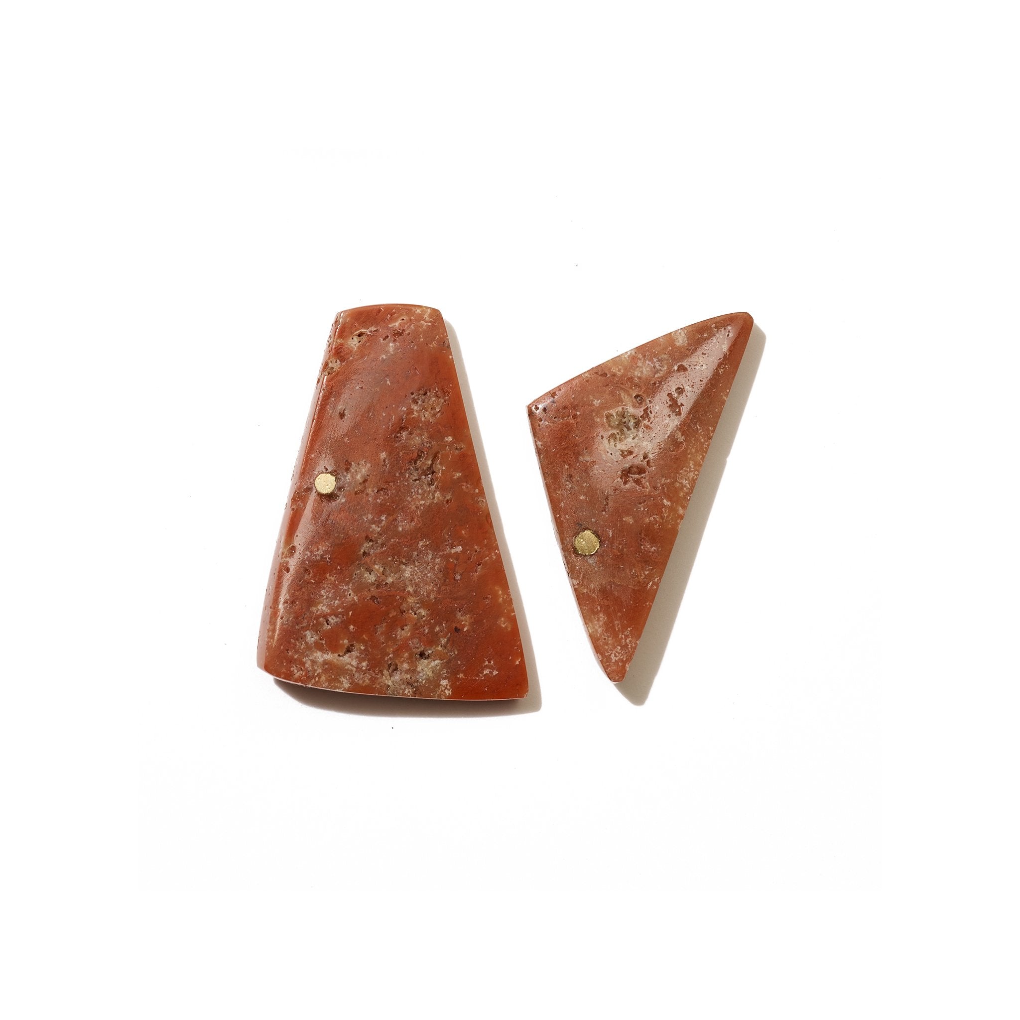 Modern and asymmetric stud earrings inspired by the work of Ellsworth Kelly and handcrafted from upcycled brass and ethically-sourced red jasper stones.