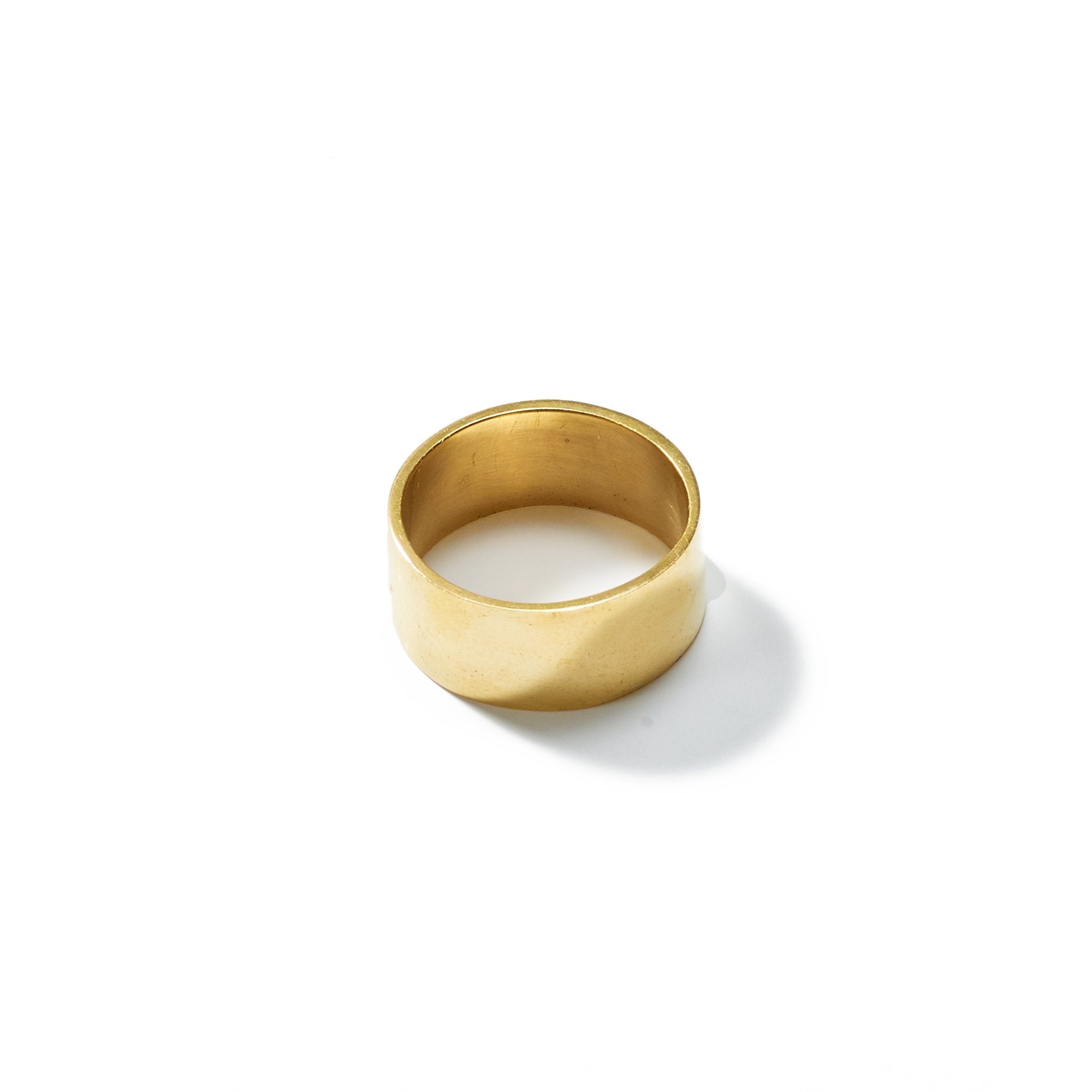 A classic and understated size 8 ring, of wide width, handcrafted from upcycled brass.Perfect for stacking or beautiful alone.