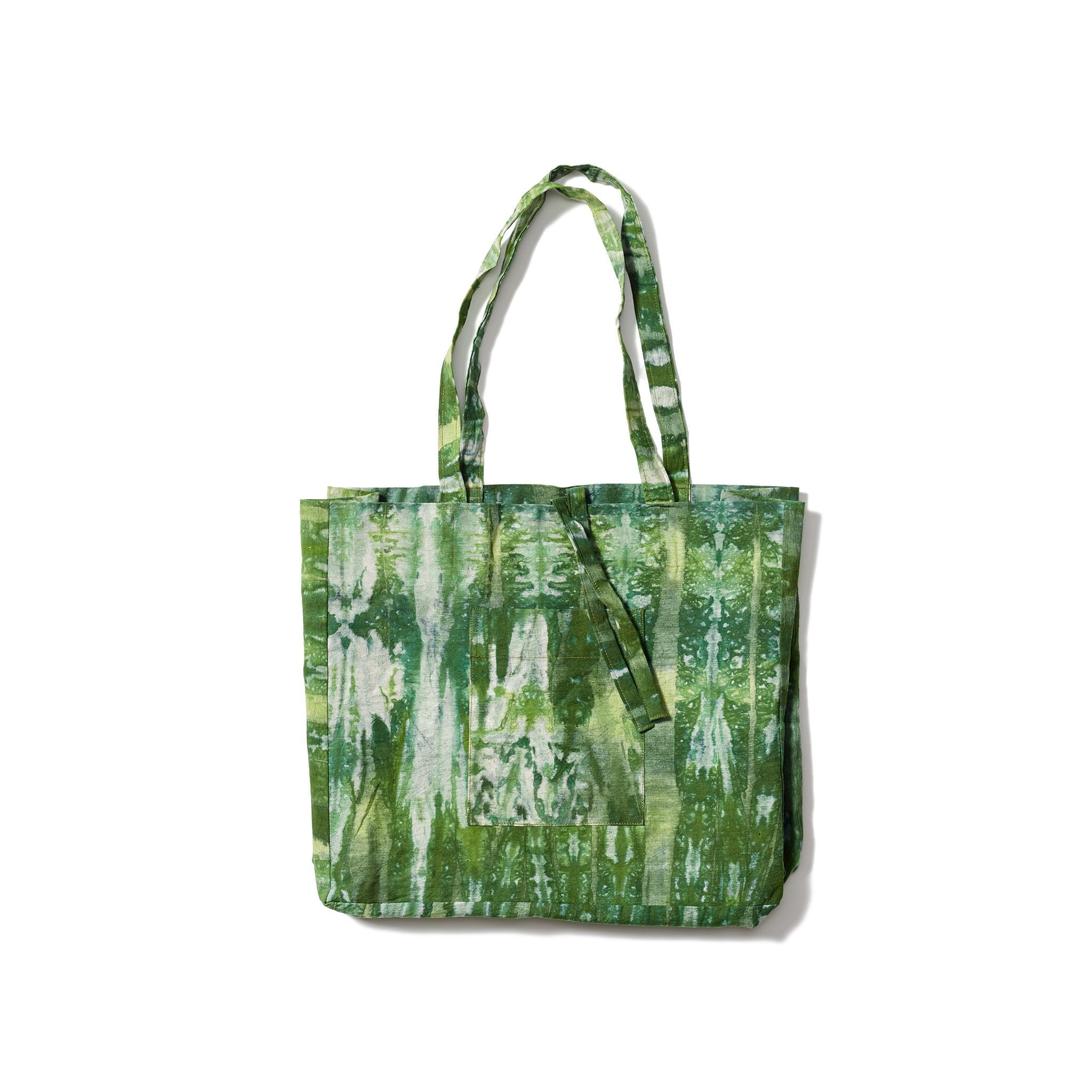A carefree and charming green tie-dye tote bag made from hand-spun 100% organic cotton and all natural dye.