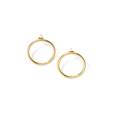 An untraditional hoop earring that sits parallel instead of perpendicular to your ear, handcrafted from upcycled brass.