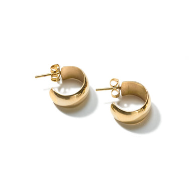 Striking yet small classic hoops handcrafted from upcycled brass to make a statement with bold, outspoken curves.