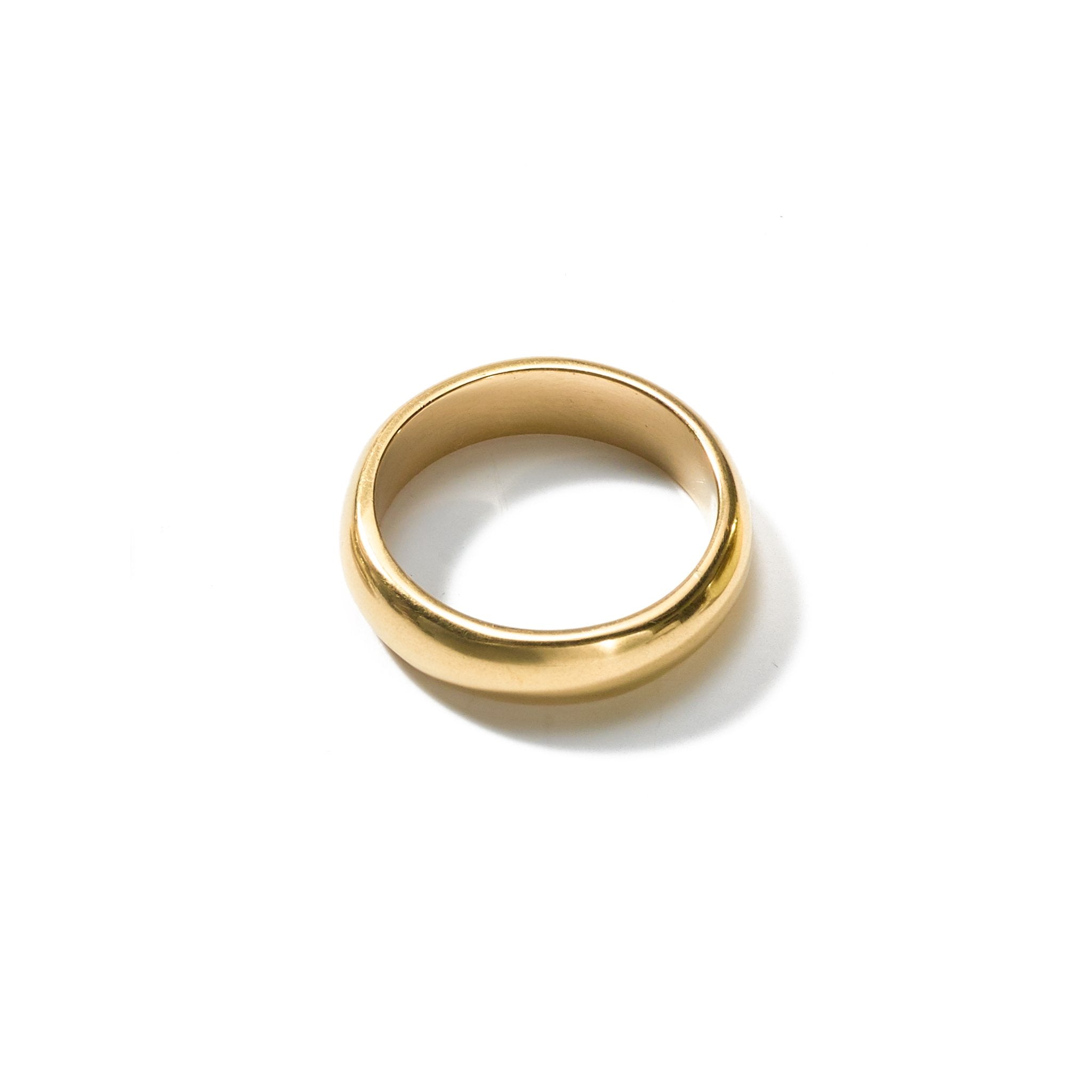 A simple yet elegant size 4.5 ring handcrafted from upcycled brass, featuring a narrow width, and made to be worn every day.