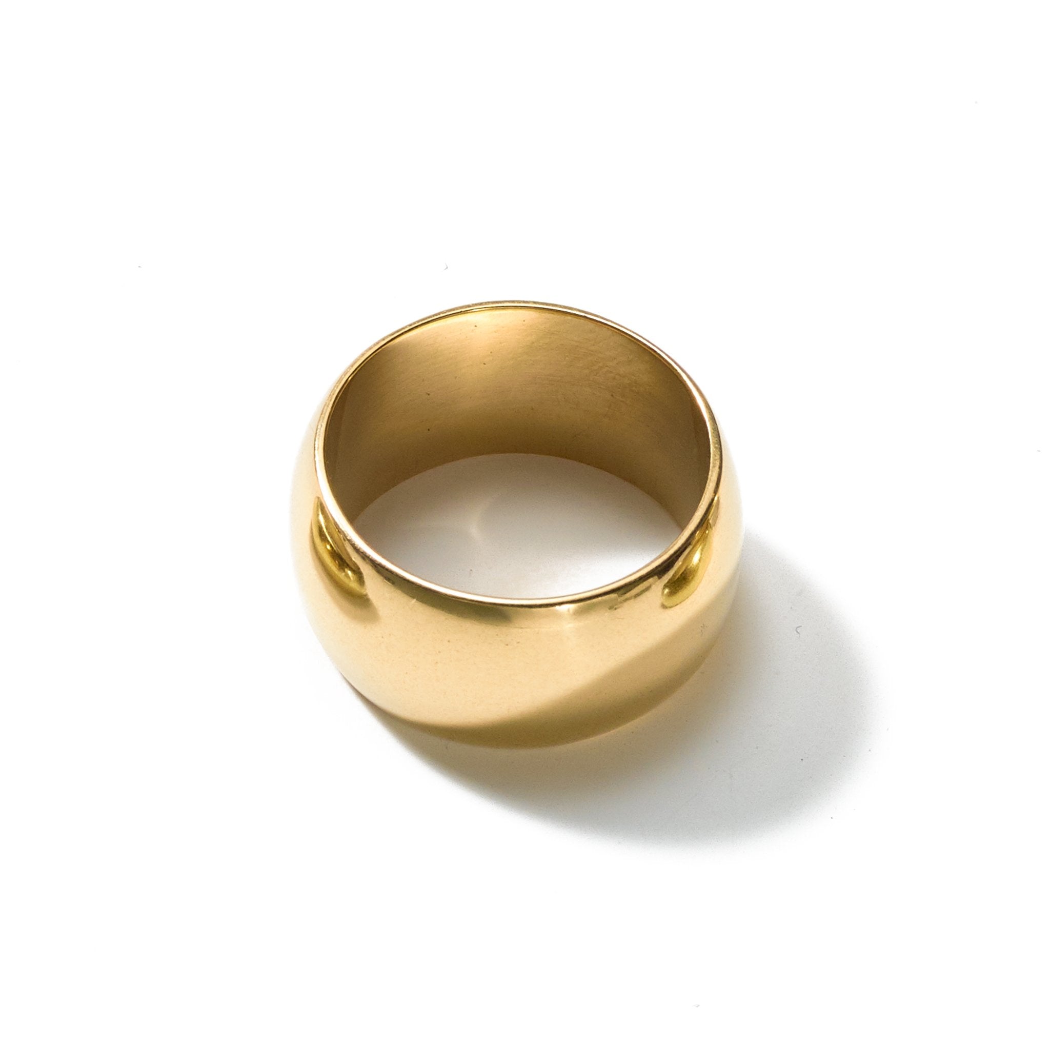 A simple yet elegant size 6 ring handcrafted from upcycled brass, featuring a wide width, and made to be worn every day.