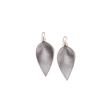 Classic design that transitions effortlessly from day to night, these silver leather leaf earrings are handcrafted from sustainable leather.