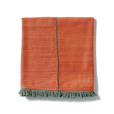 A beautifully made red throw hand-spun from Ethiopian silk and cotton.
