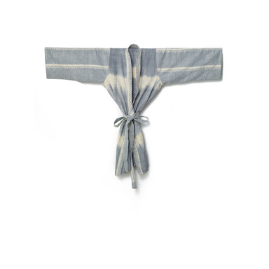 Elevate your next at-home spa day with this grey tie-dye kimono, hand-woven from 100% Ethiopian cotton and dyed in small batches.