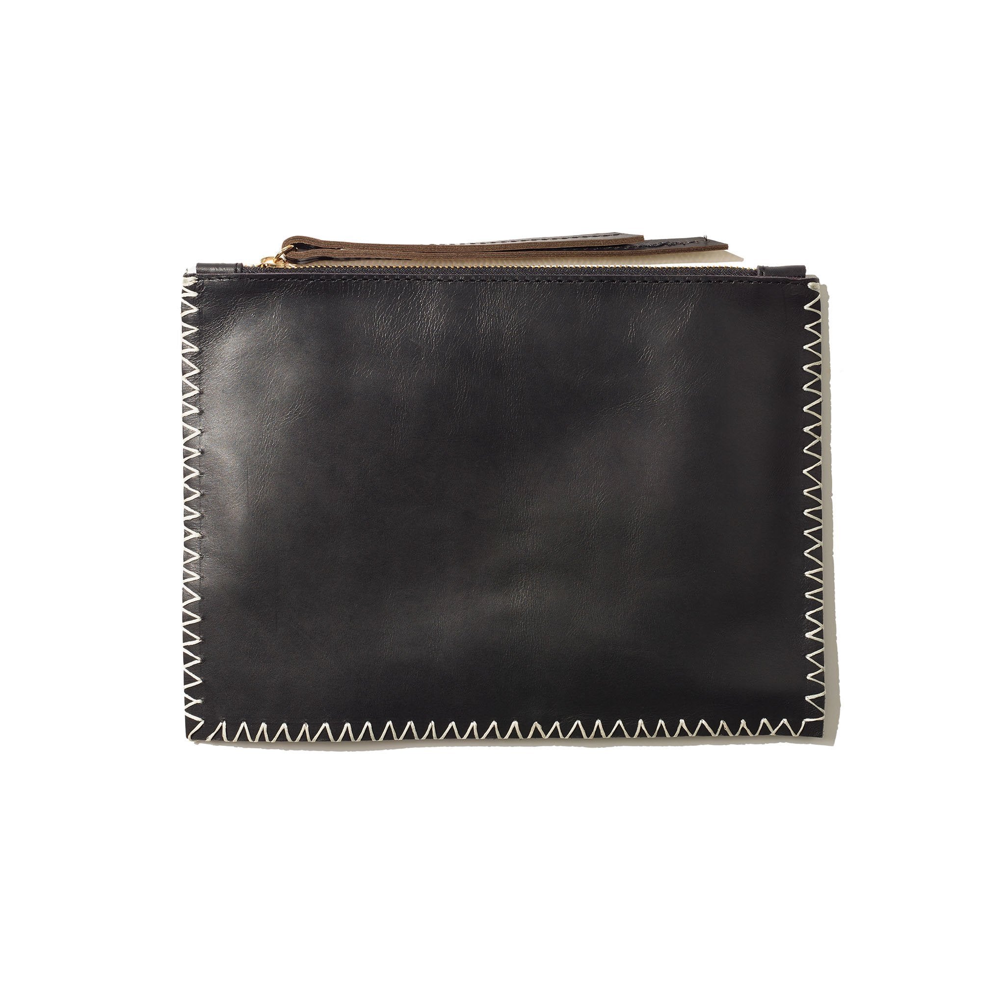 An black pouch with understated contrast stitching, handcrafted from sustainable leather.