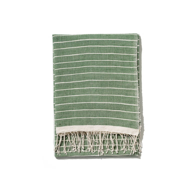 Recreate the spa in your bathroom with this green striped towel, hand-woven from 100% Ethiopian cotton, dyed in small batches and hand-fringed.