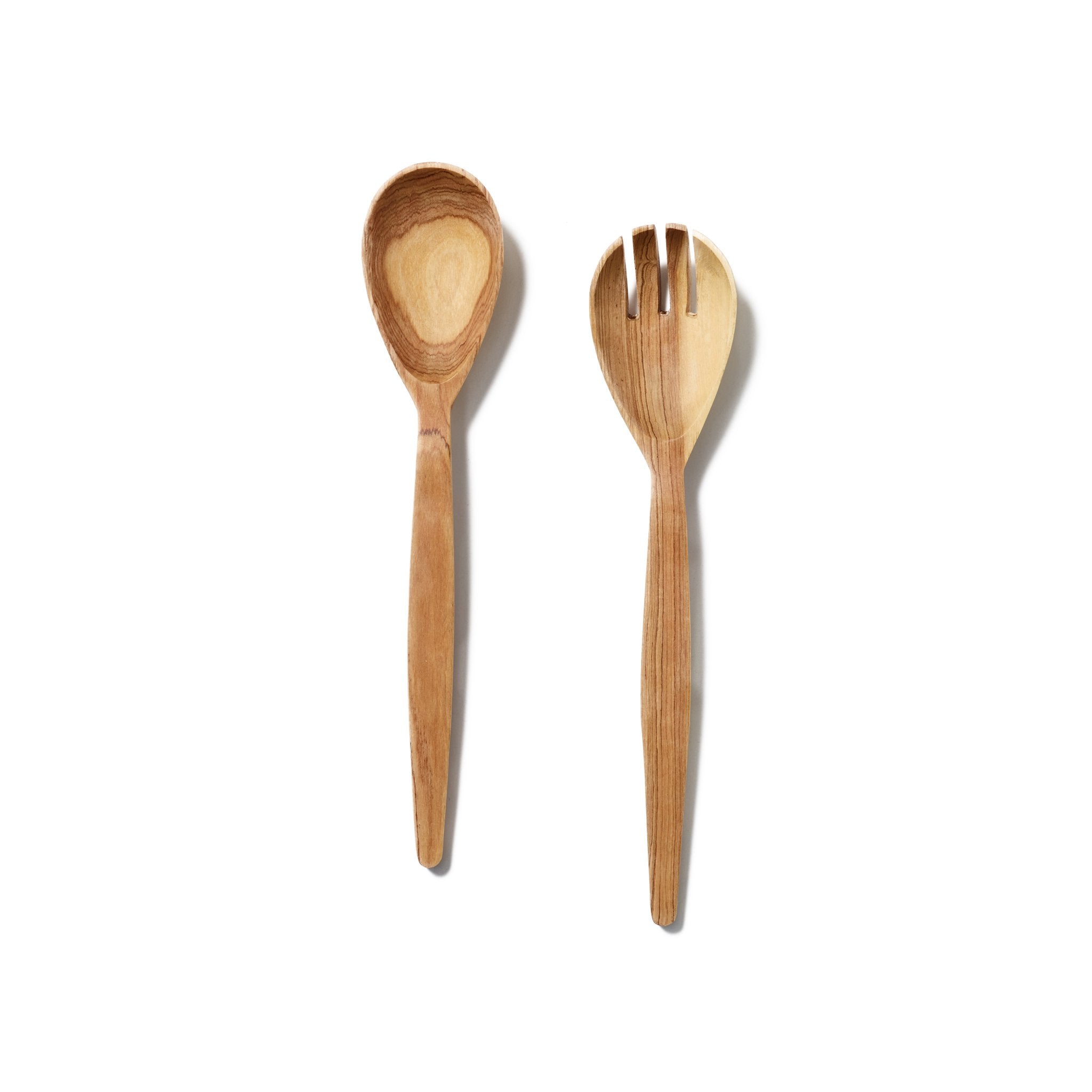 Make a simple salad or pasta dish more inviting with our wooden serving set, handcrafted from all natural olive wood.