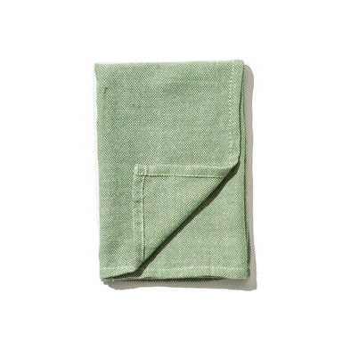 Update your table with this green napkin, hand-woven from 100% Ethiopian cotton and dyed in small batches.