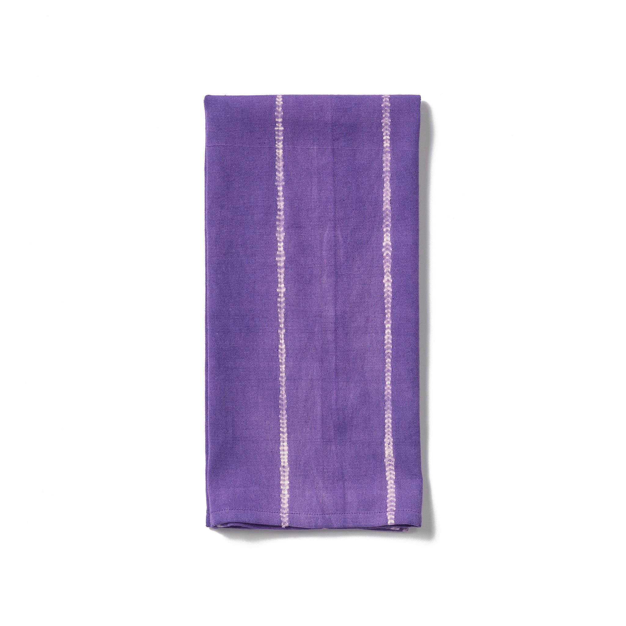 Update your kitchen with this chic yet durable and absorbent purple tie-dye kitchen towel, hand-woven from 100% Ethiopian cotton and dyed in small batches.