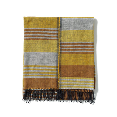 Breathe new life into your space with this yellow and brown throw, hand-woven from 100% Ethiopian cotton and dyed in small batches.