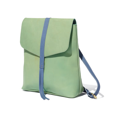 An ideal travel companion, this mint and blue backpack is handcrafted from sustainable leather and features a snap closure and interior pocket.